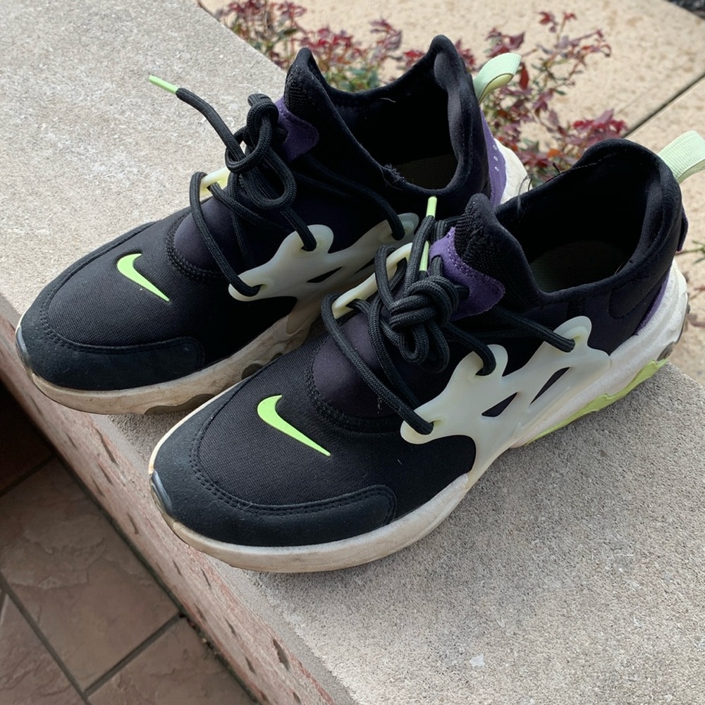 Nike tennis shoes.  Nike sneakers.